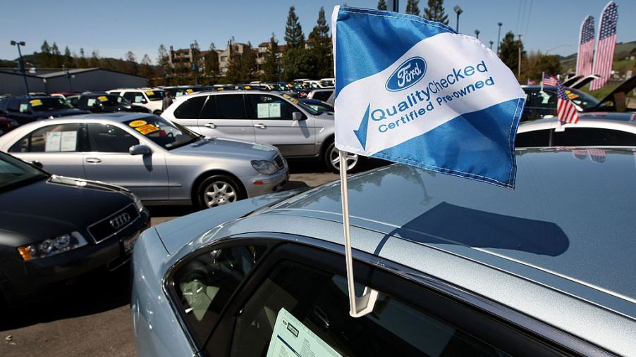 A certified pre-owned flag is seen on a used car for sale