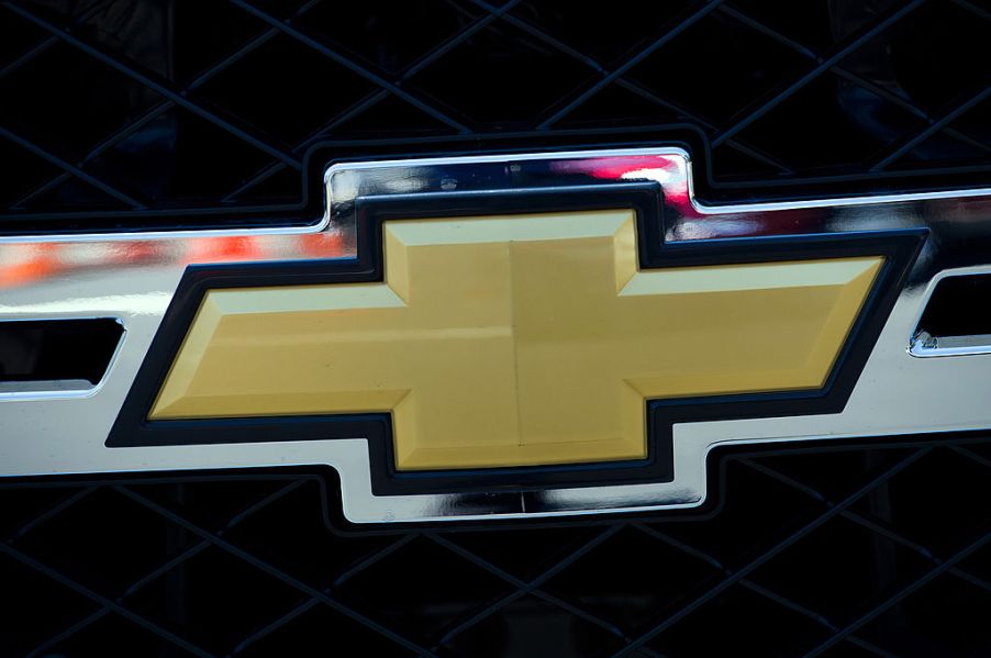 The Chevrolet logo on the front of a Silverado.