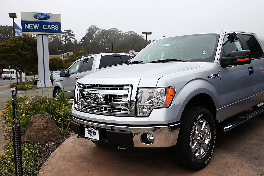 A new Ford F-150 for sale on a dealership lot.