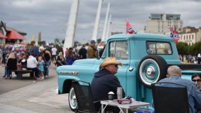SOUTHEND ON SEA, ENGLAND - JUNE 17: People sit by their Chevrolet Apache 31 American pickup truck during the Southend Classic Car Show along the seafront on June 17, 2018 in Southend on Sea, England. (Photo by John Keeble/Getty Images)