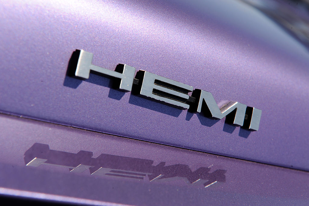 A HEMI logo on the side of a car.