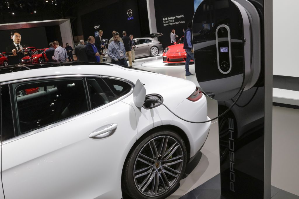 A concept electric vehicle from automaker Porsche is plugged in and charging at the 2017 New York International Auto Show