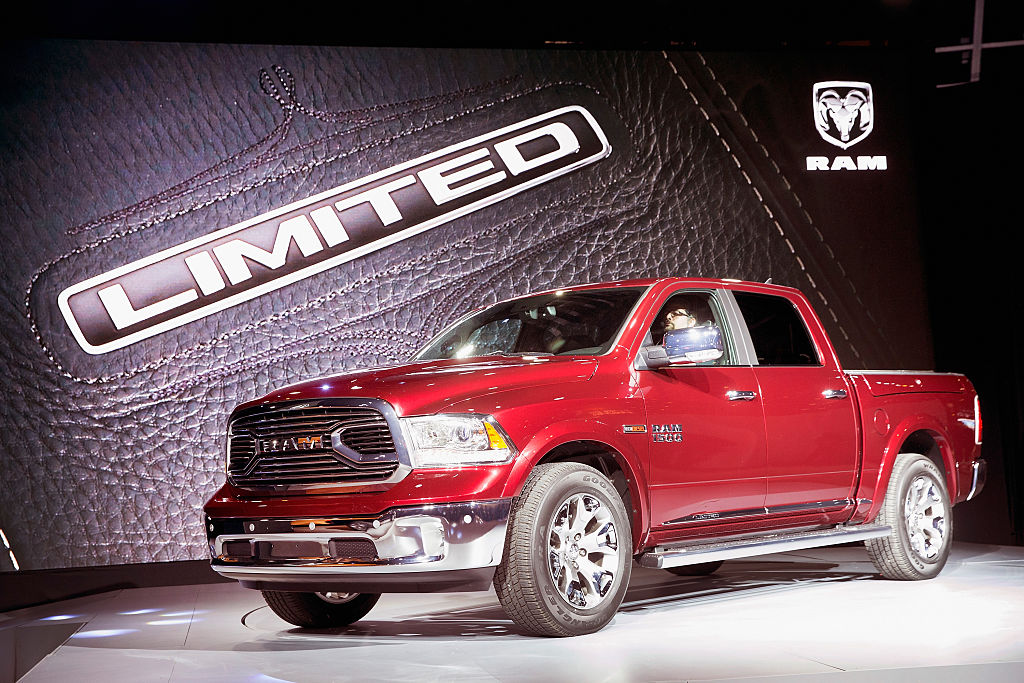 The Ram 1500 Laramie Limited pickup truck on display in red