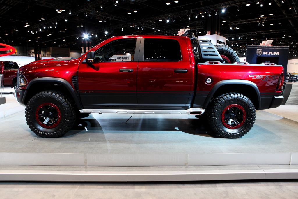A Ram 1500 Rebel TRX pickup on display at an auto show.