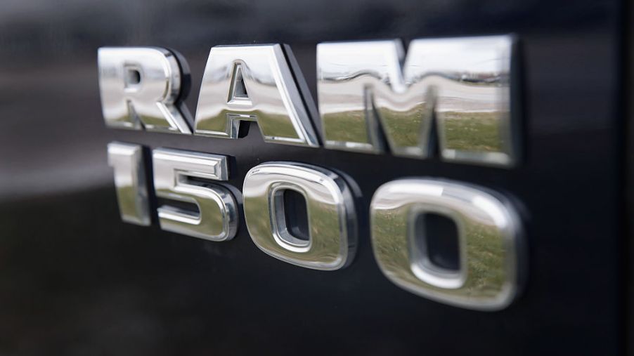 A Ram 1500 logo on a black truck