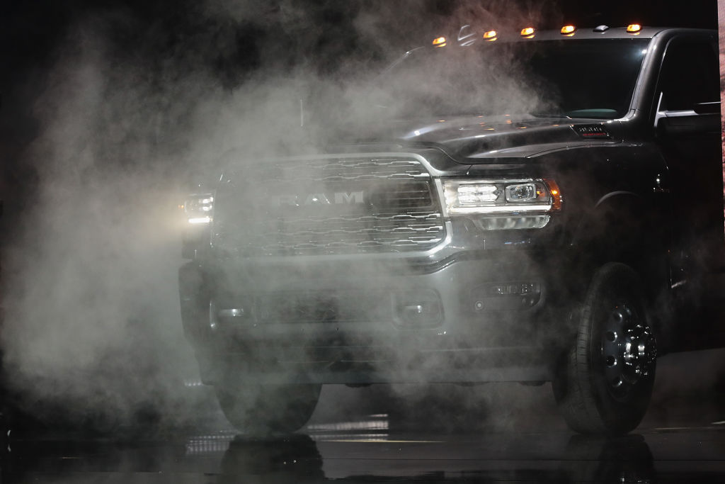 A heavy duty Ram 3500 diesel appears to release visible emissions