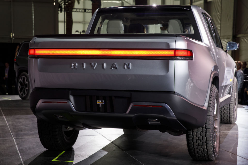 A Rivian R1T on display during an auto show.