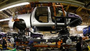 The body and chassis of a Ram pickup truck being assembled