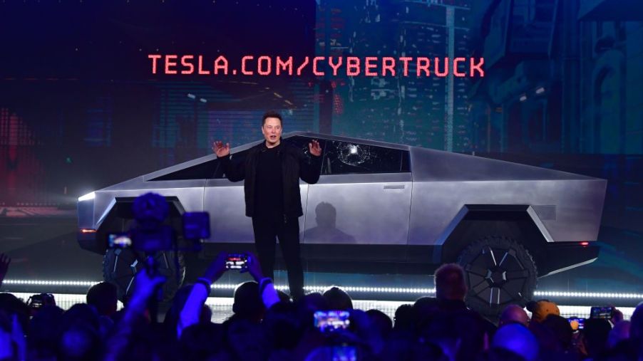 Tesla co-founder and CEO Elon Musk speaks in front of the newly unveiled all-electric battery-powered Tesla's Cybertruck