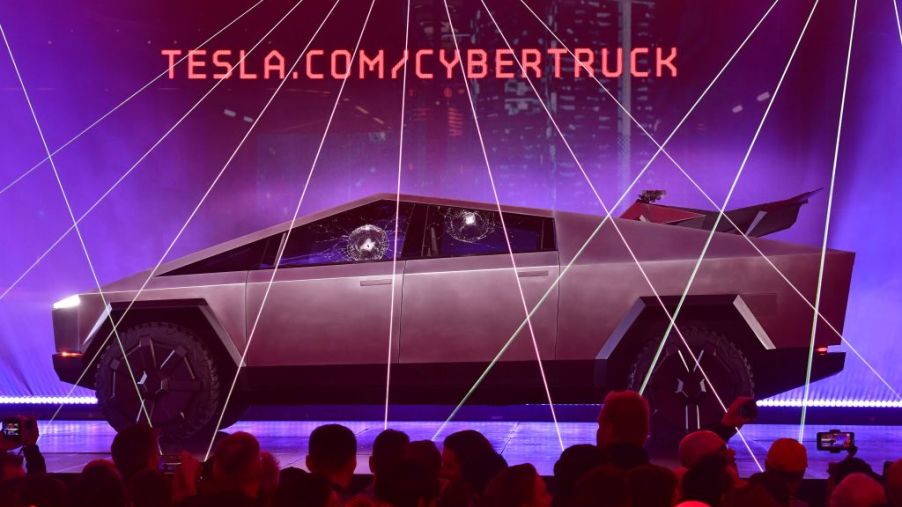 The Tesla Cybertruck reveal shows the truck on stage.