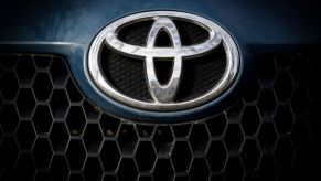 Toyota's logo on the front of a truck.