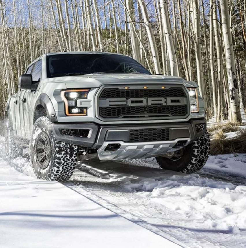 2018 Ford F-150 Raptor pickup truck in the snow