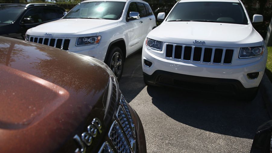 2014 Jeep Cherokees for sale at a car dealership