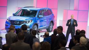 A 2016 Honda Pilot on display at an auto show