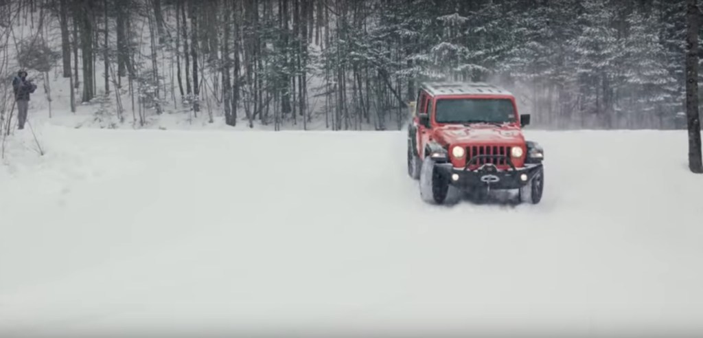 2018 Jeep Wrangler Unlimited Rubicon drifting through forest
