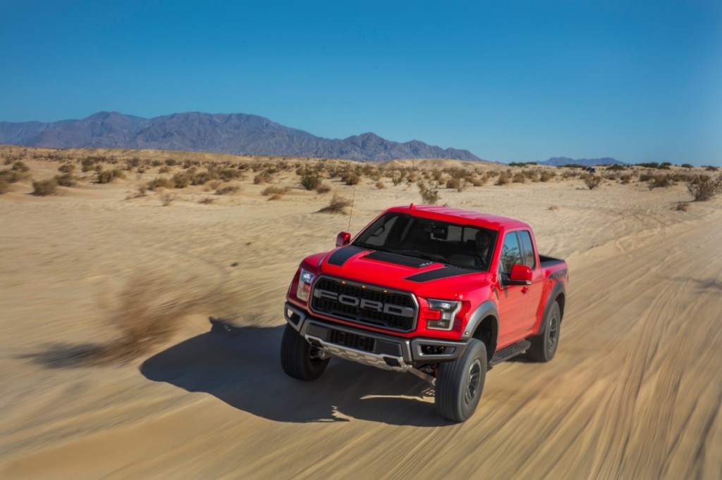 The 2020 Ford F-150 races down a sandy road