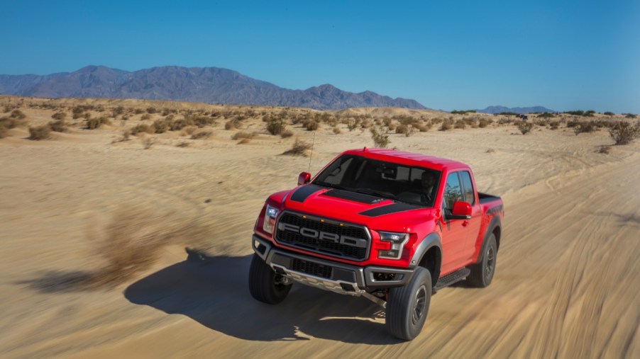 The 2020 Ford F-150 races down a sandy road
