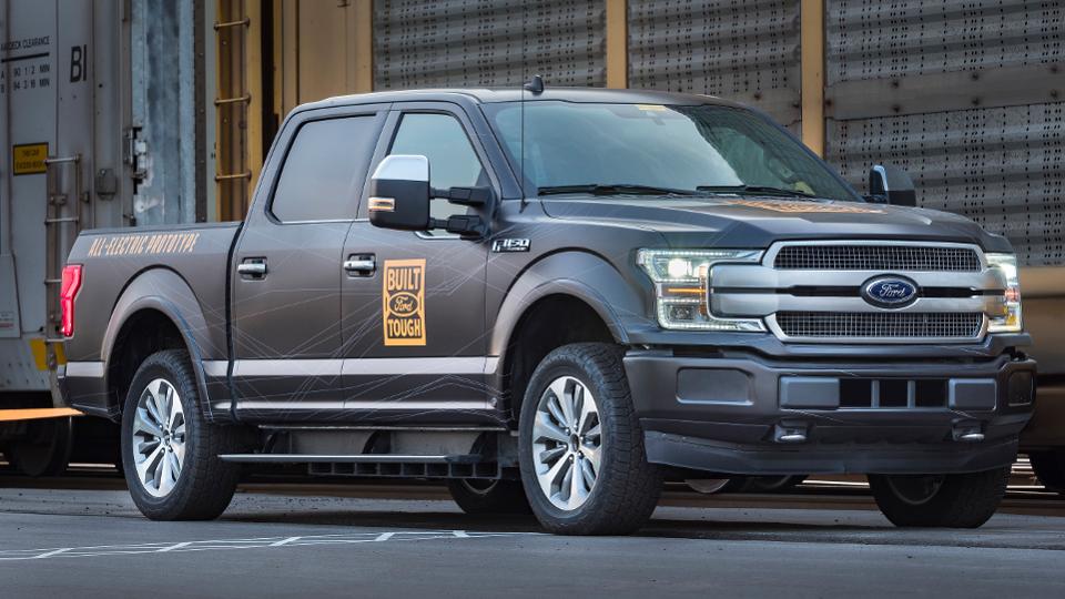 2021 Ford F-150 EV parked in front of building