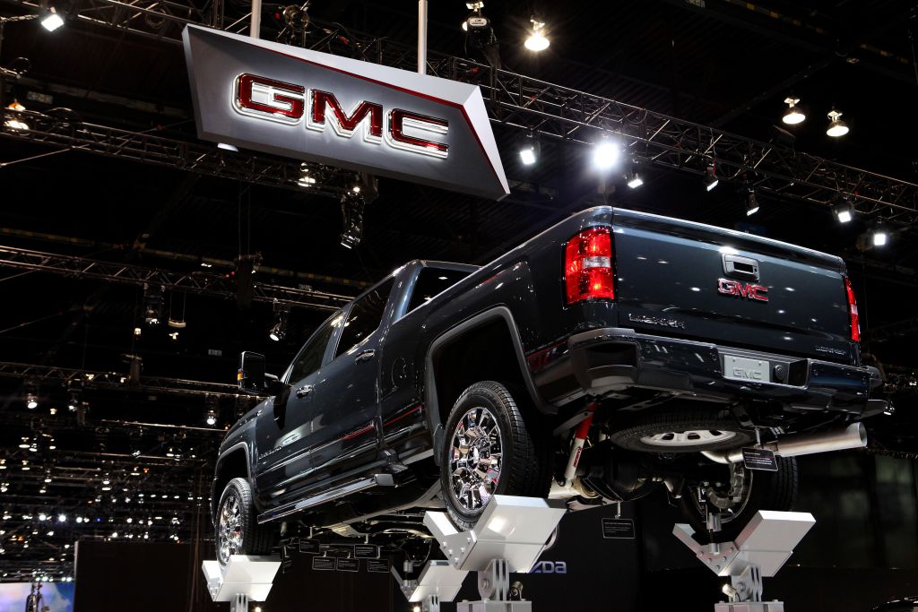 A GMC Sierra on display at an auto show.