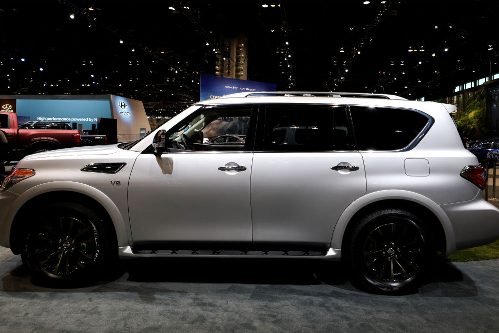 A Nissan Armada SUV on display at an auto show.