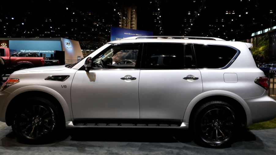 A Nissan Armada SUV on display at an auto show.