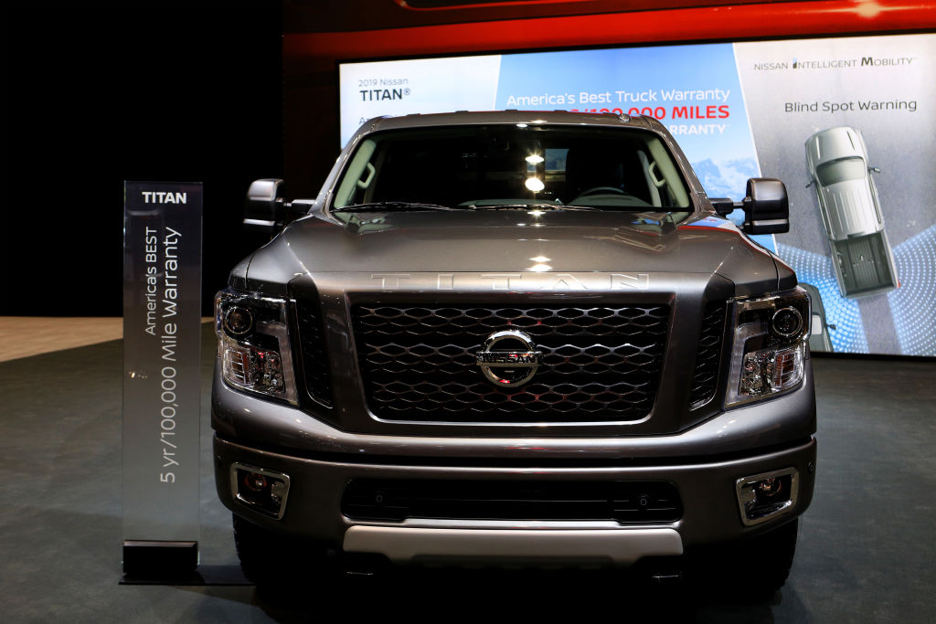A Nissan Titan on display at an auto show.
