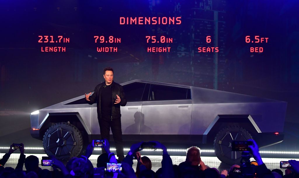 Elon Musk discusses vehicle dimensions at the unveiling of the new Tesla Cybertruck.