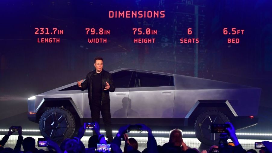 Elon Musk discusses vehicle dimensions at the unveiling of the new Tesla Cybertruck.