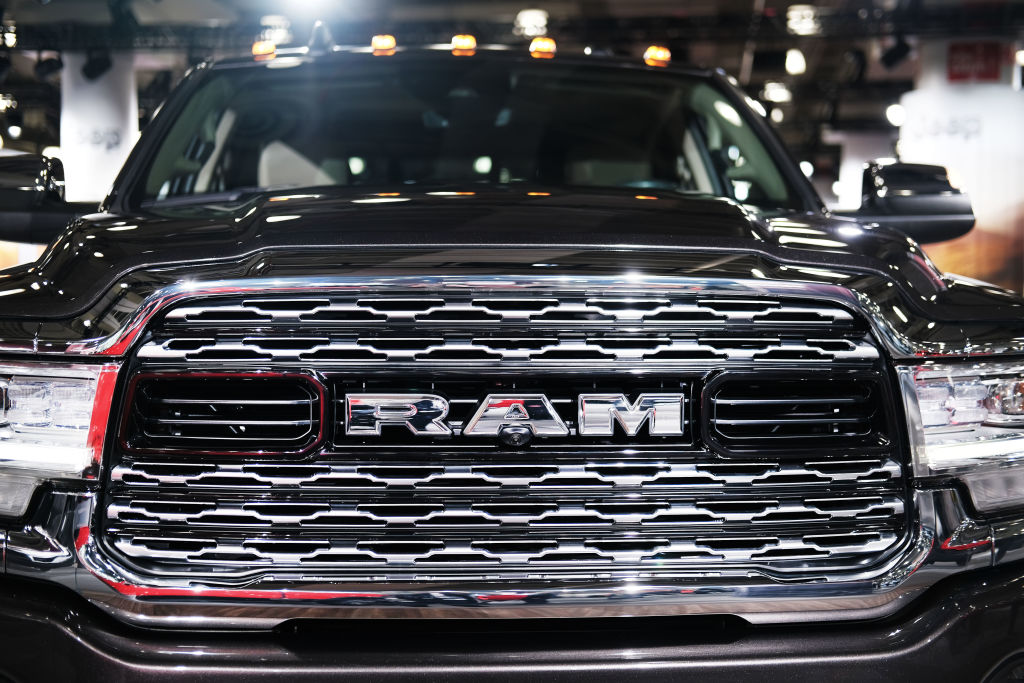 The grill of a 2020 Ram truck is displayed at the New York International Auto Show