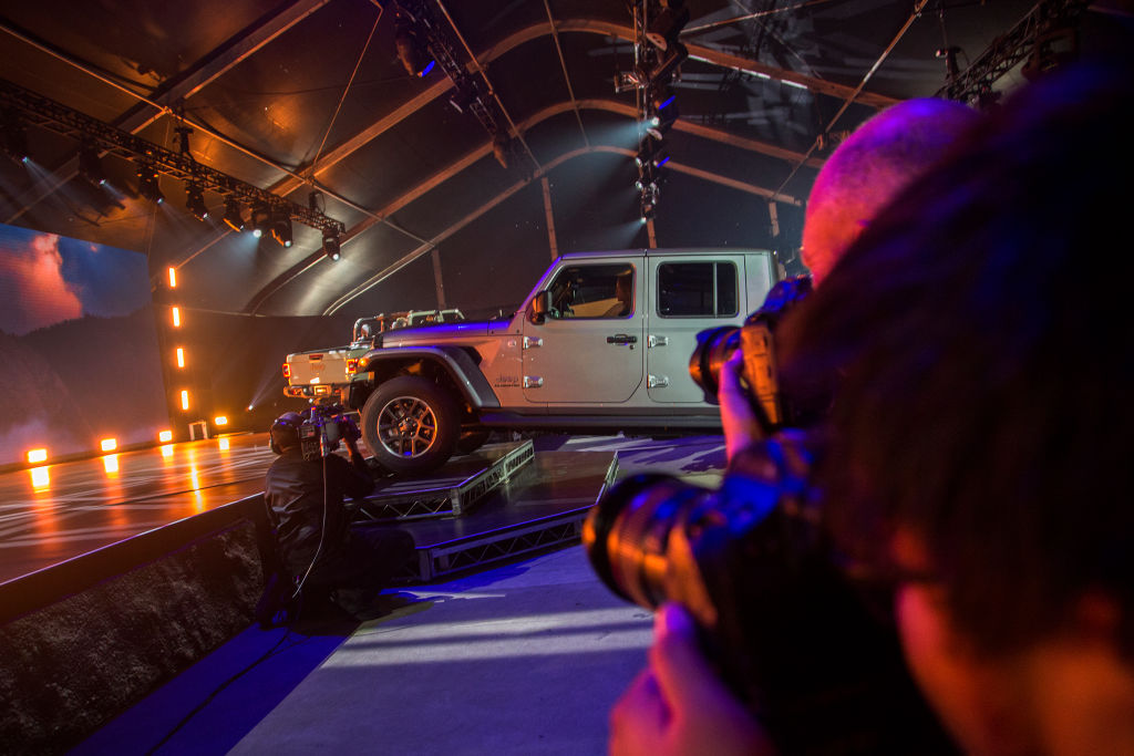 The Jeep Gladiator truck is shown during an auto trade show