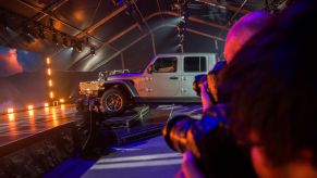 The Jeep Gladiator truck is shown during an auto trade show