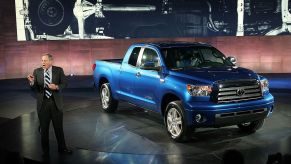 A Toyota Tundra being unveiled at an auto show.