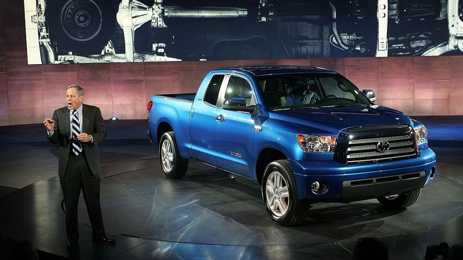 A Toyota Tundra being unveiled at an auto show.