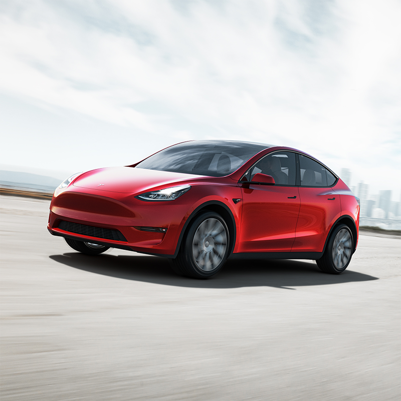 2020 Tesla Model Y driving on pavement