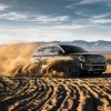 2020 Kia Telluride driving through sand