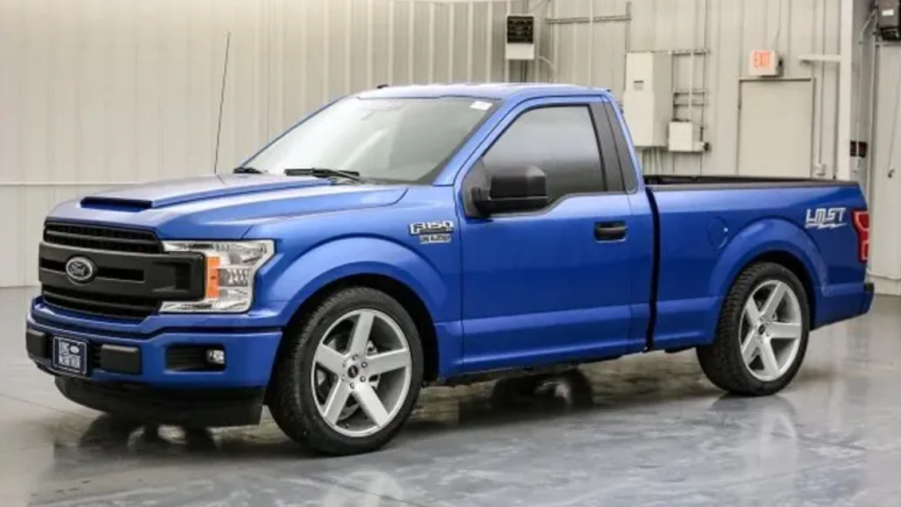 2019 Ford F-150 two door truck parked near warehouse