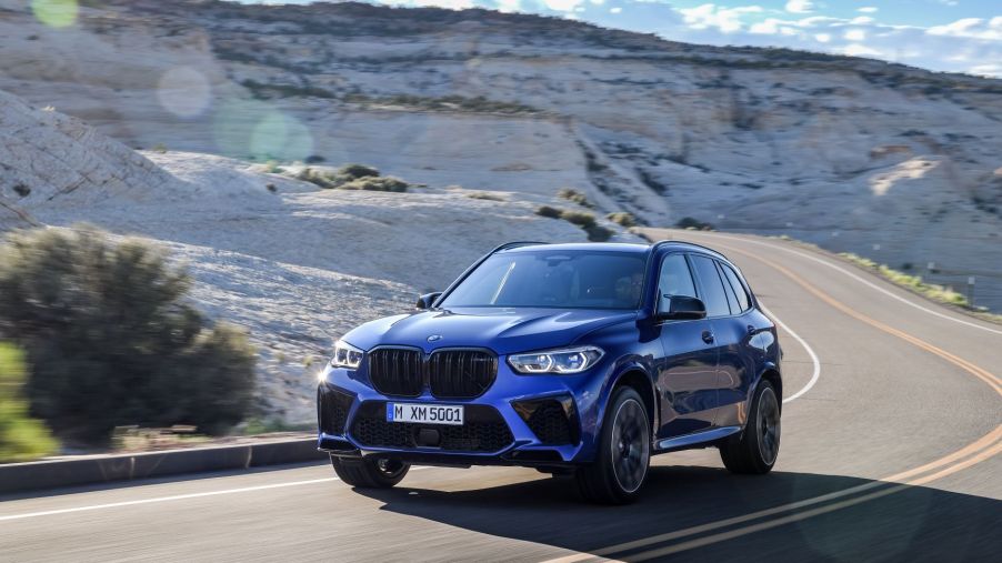 2020 BMW X5 M driving up mountain road