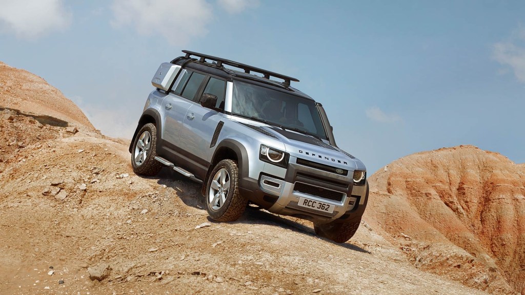 2020 Land Rover Defender 110 driving off-road in the desert