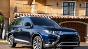 2020 Mitsubishi Outlander PHEV parked in front of home