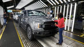 Ford F-150 trucks at the customer acceptance line at the Ford Dearborn Truck Plant