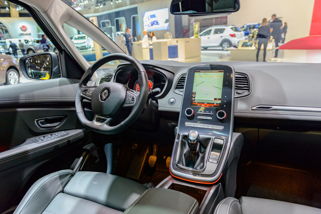 The interior of a car that features a touchscreen
