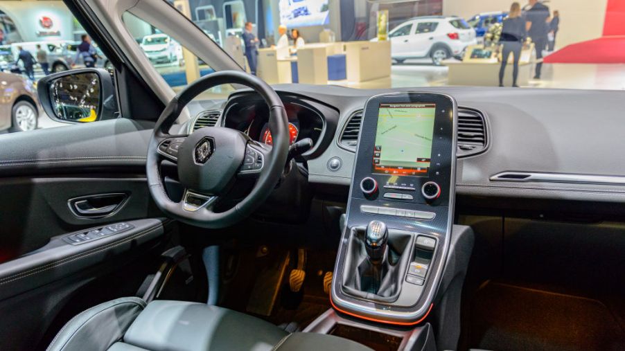 The interior of a car that features a touchscreen