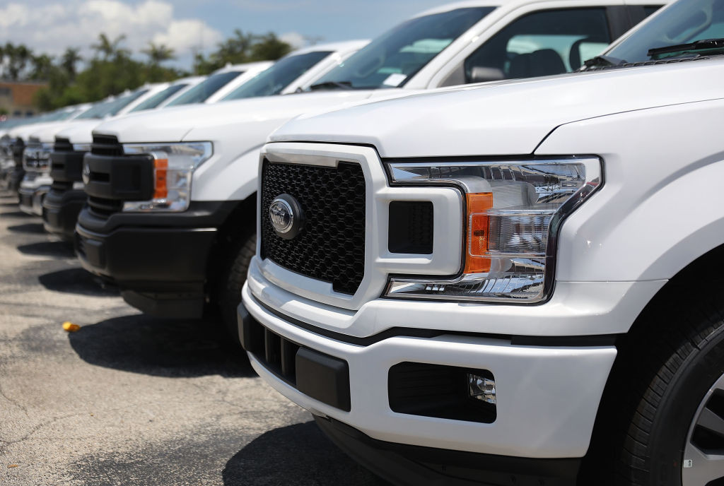 Ford F-150 trucks for sale at a dealership in Miami