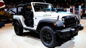A special edition Jeep Wrangler Willys on display at an auto show