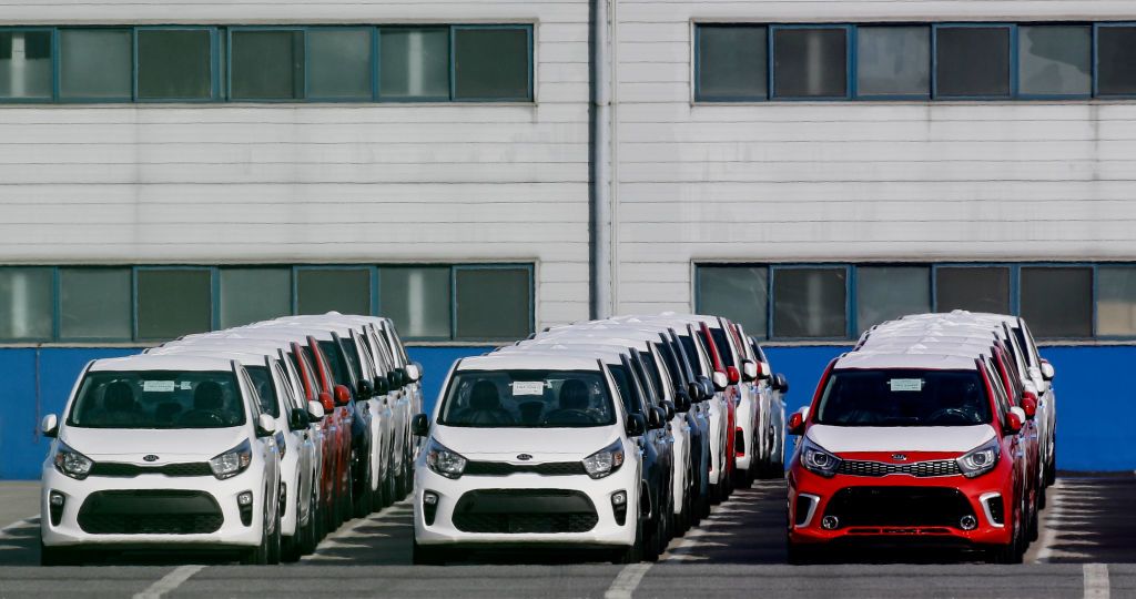 A shipment of Kia cars waiting to be loadd