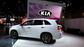 A white Kia Sorento on display during an auto show