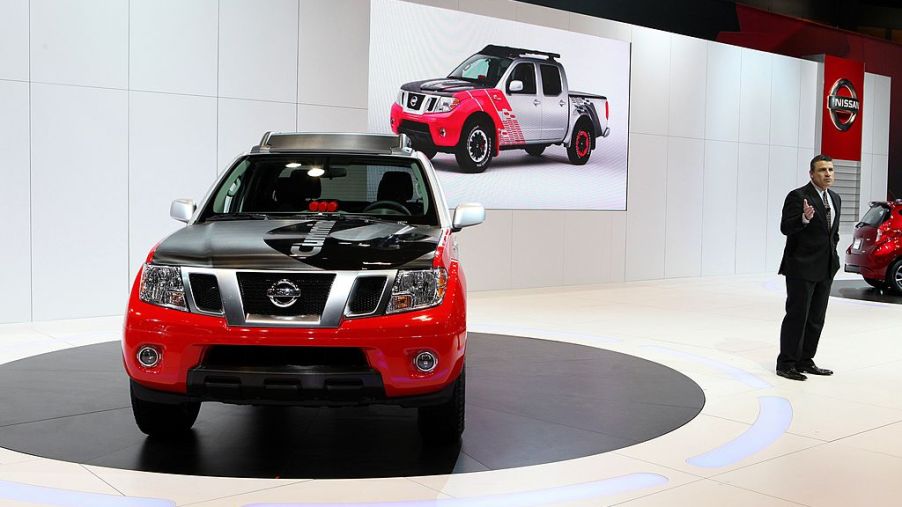 A Nissan Frontier new model being display at an auto show