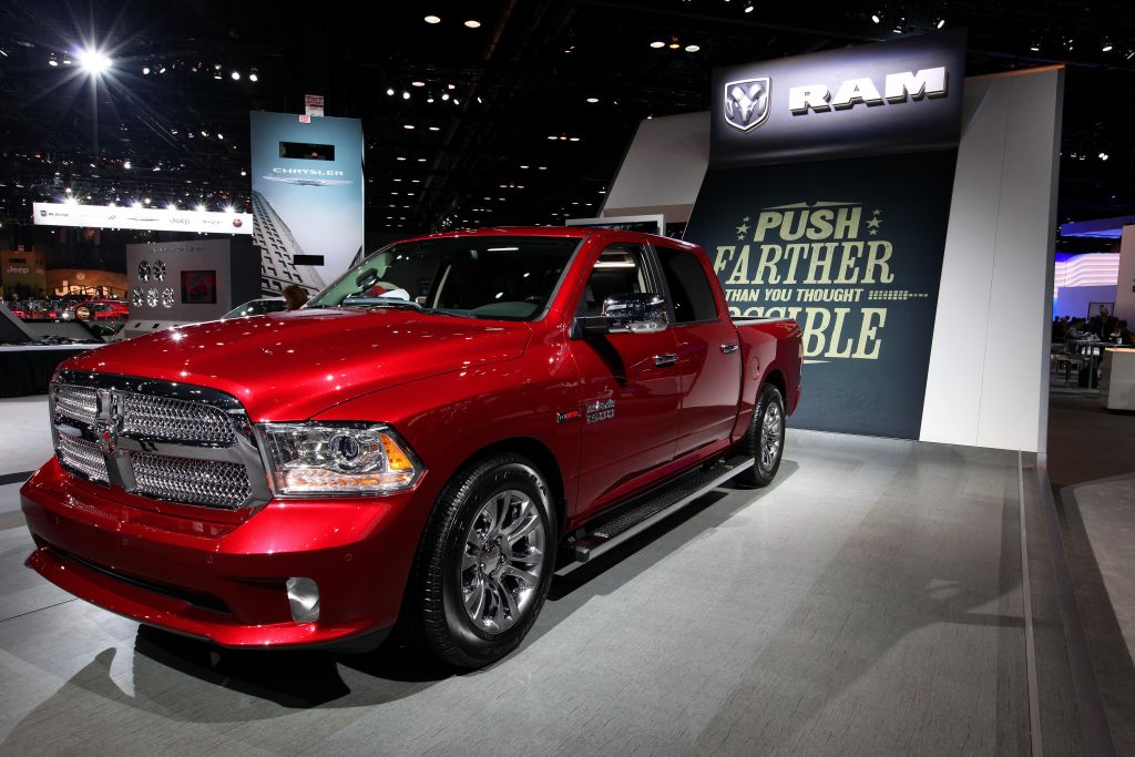 A red Ram 1500 on display at an auto show