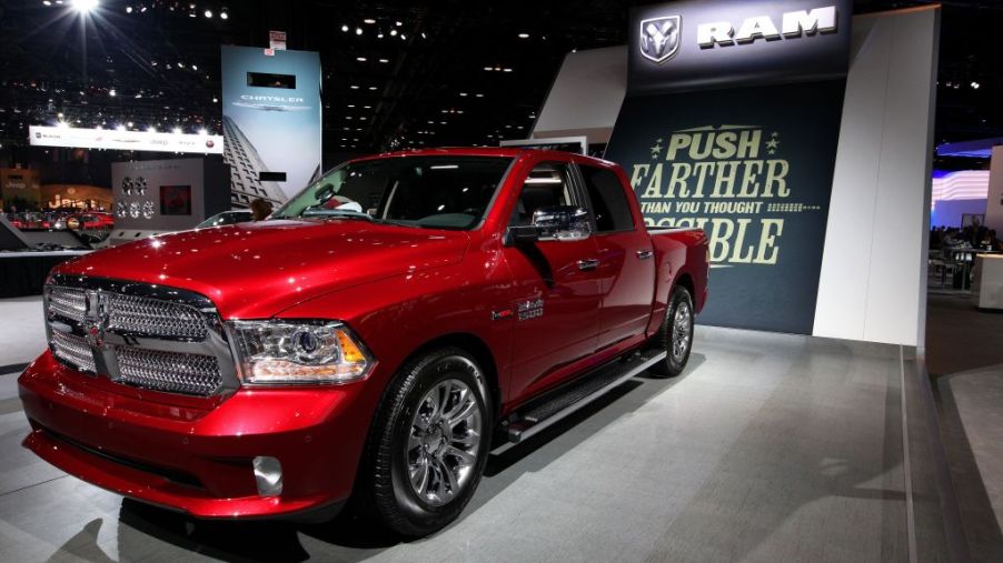 A red Ram 1500 on display at an auto show
