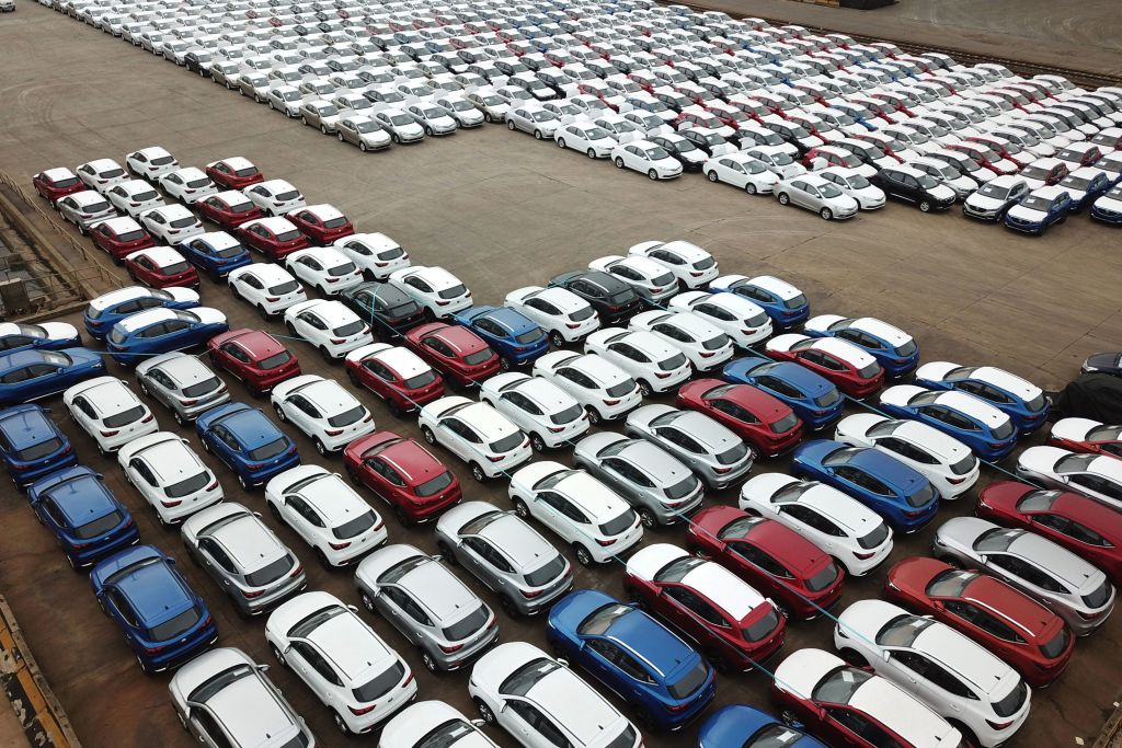 A car lot filled with cars produced in China